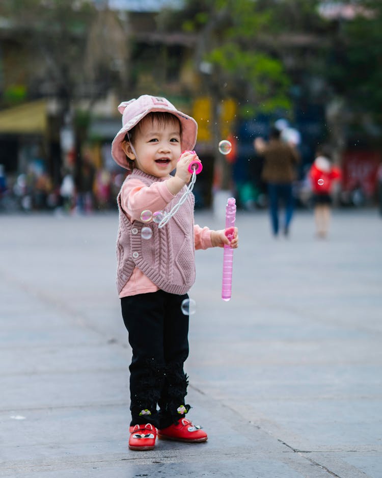 Cute Baby Blowing Bubbles