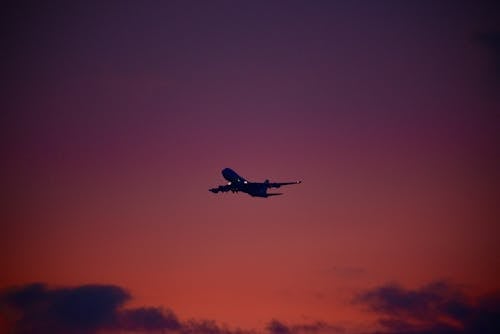 Ingyenes stockfotó éjszakai égbolt, repülés, repülőgép témában
