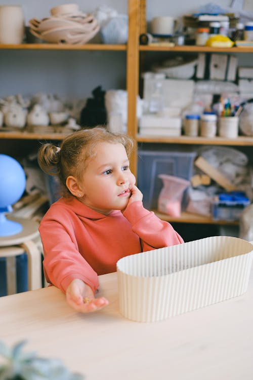 A Little Girl with Her Finger in Her Mouth