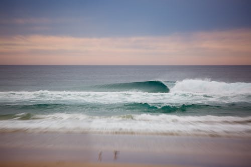 Scenic View of Ocean During Dawn