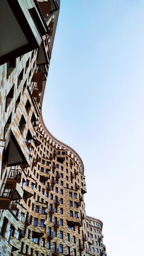 Free Stunning architectural view of a wavy residential building in Moscow, Russia, showcasing modern design. Stock Photo