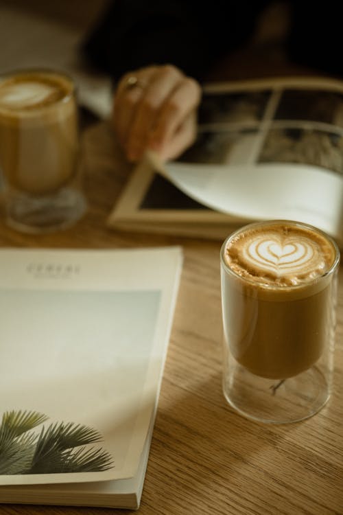 Close-up View of Books and Coffee in Glasses