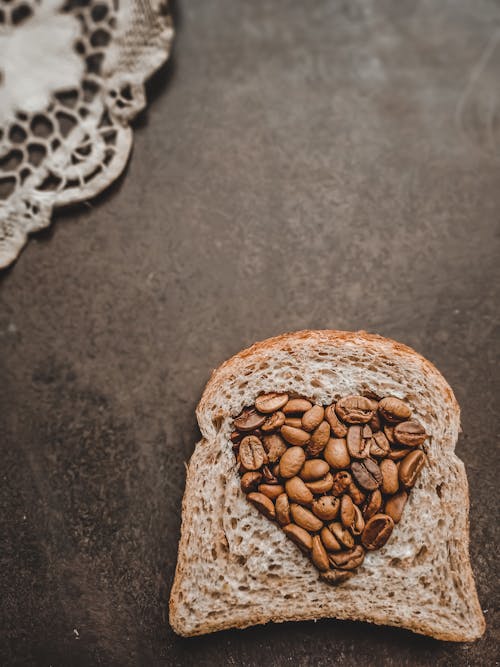 Nuts in Heart Shape on Toast Bread