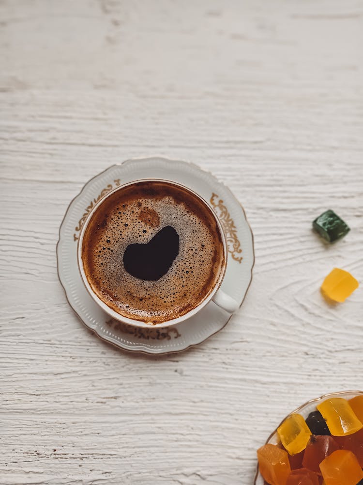 A Cup Of Coffee And Jellies