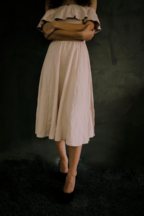 A Woman in Beige Dress