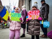 Girls with Signs on Protest against Russian War on Ukraine