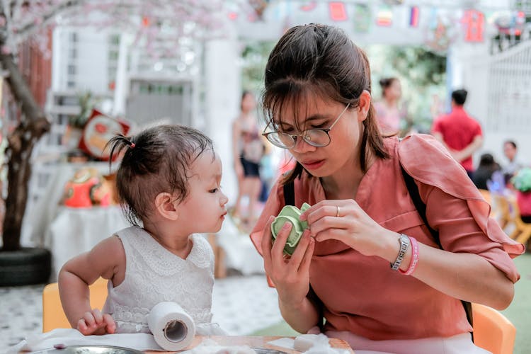 Woman And Child Doing Crafts