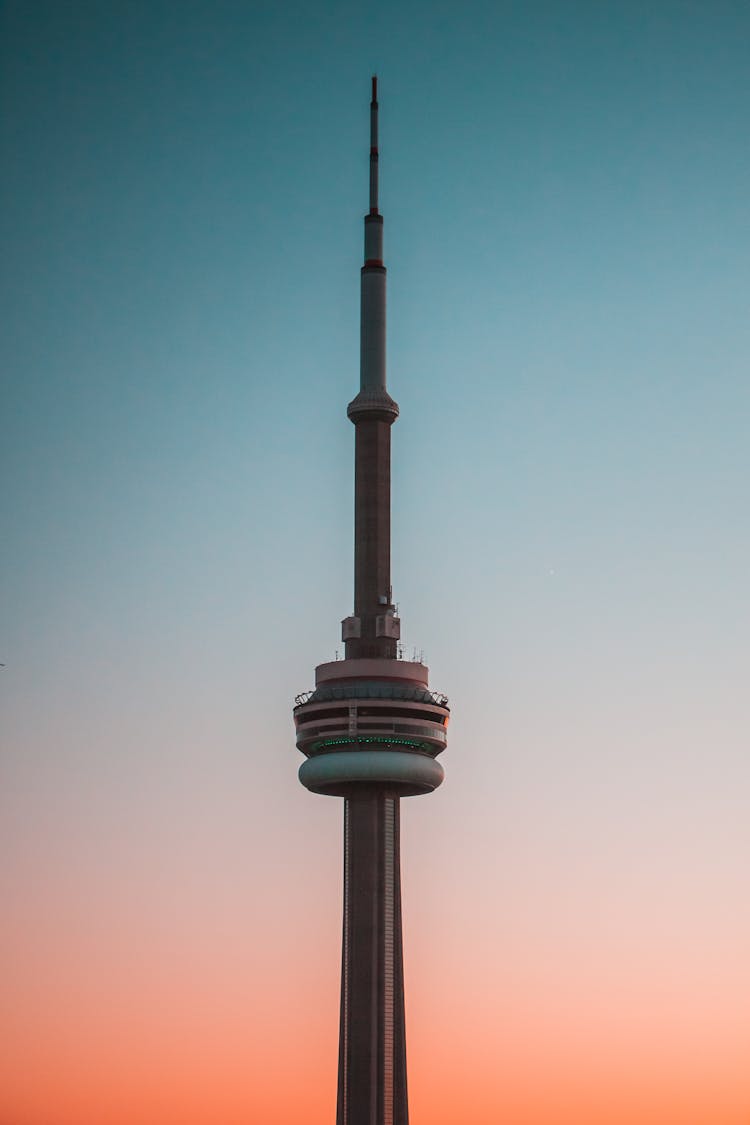 Clear Sky Over Top Of Skyscraper At Dusk