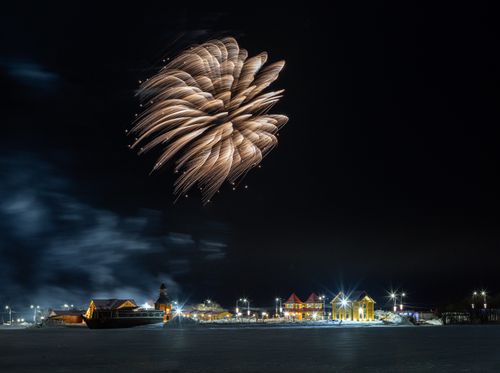 Free Stunning long-exposure shot of fireworks lighting up the night sky over Kamchatka, Russia. Stock Photo