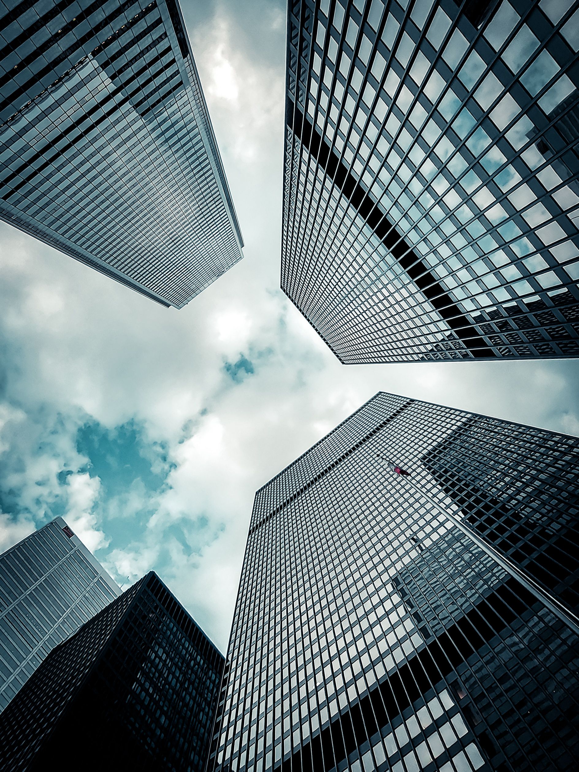 Low Angle Photography of High Rise Buildings Under the Blue Sky · Free ...