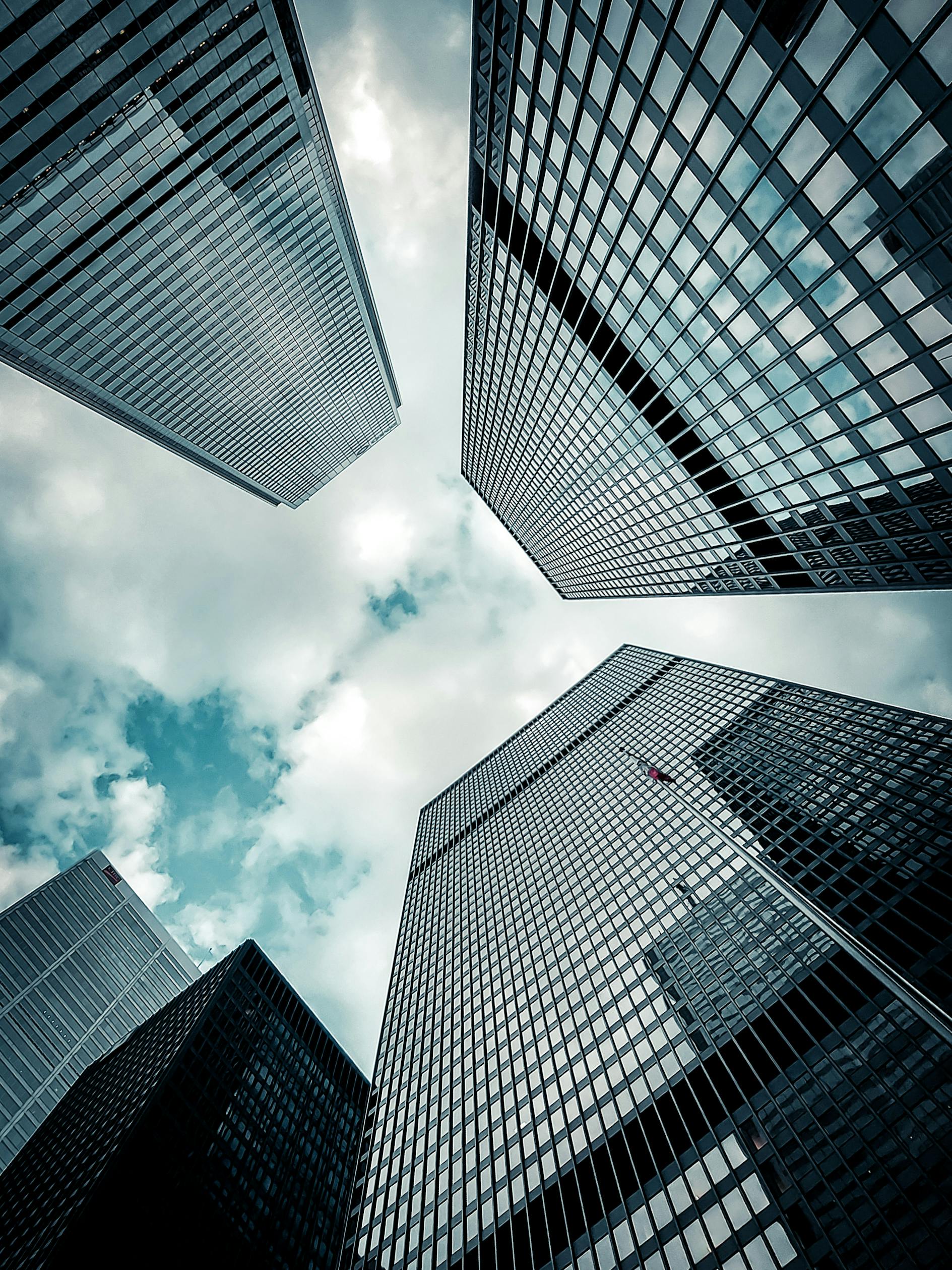 Low Angle Photography Of Tall Building Buildings · Free Stock Photo