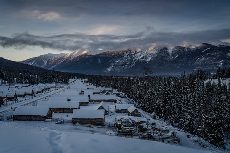 Snow-covered Houses In Village