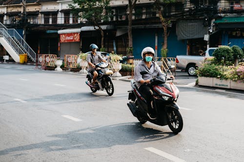 Men Riding Motorcycles on the Road