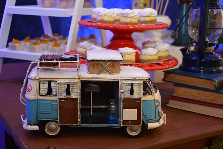 Scale Model Of Classic VW Camper Van On The Table