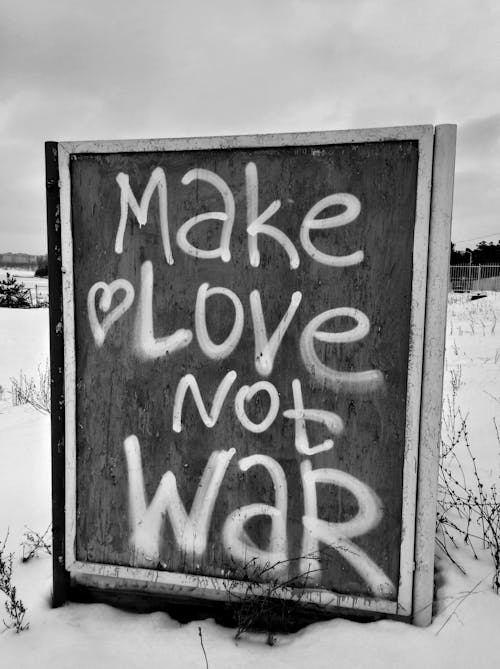 A Wooden Sign with Anti War Message 