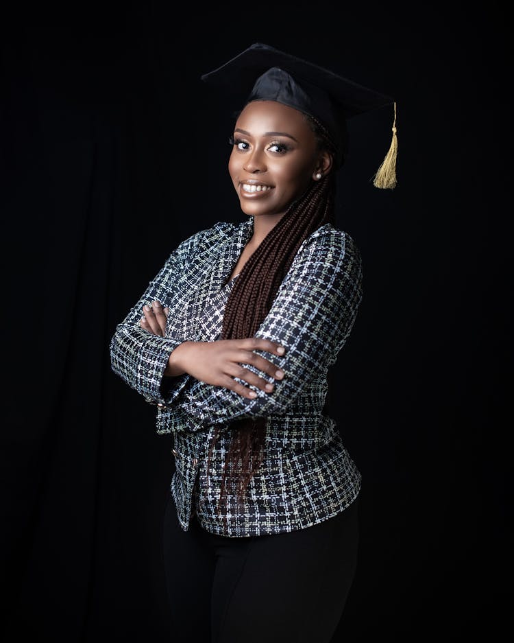 Portrait Of Woman In Shirt With Graduation Cap