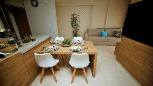 Free Wooden Table with White Chairs Stock Photo