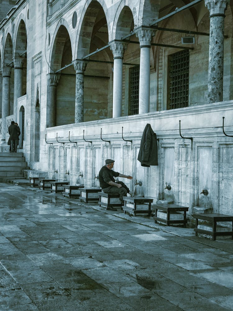 Man Washing His Feet In Mosque Of Muhammad Ali