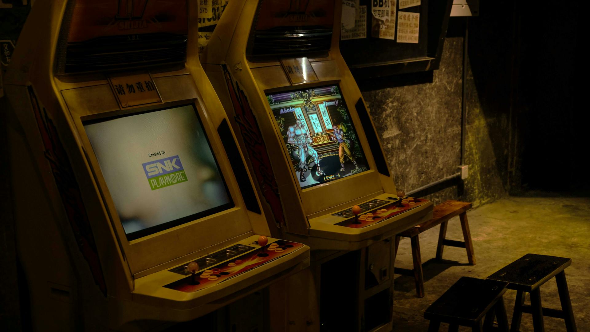 Explore retro arcade machines in a dimly lit gaming area in Changsha, China, capturing nostalgic vibes.