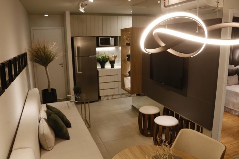 Luxurious modern living room setup featuring elegant lighting and decor.
