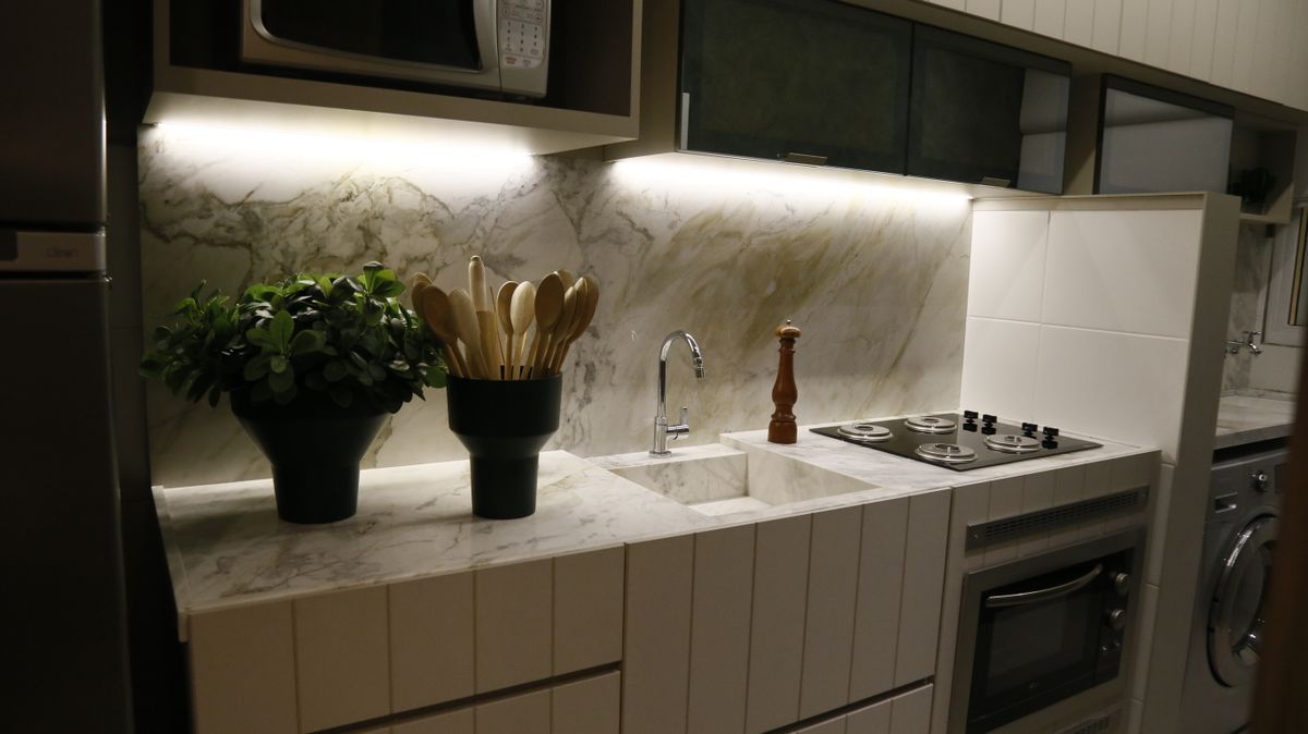 Stylish modern kitchen with countertop and cabinetry