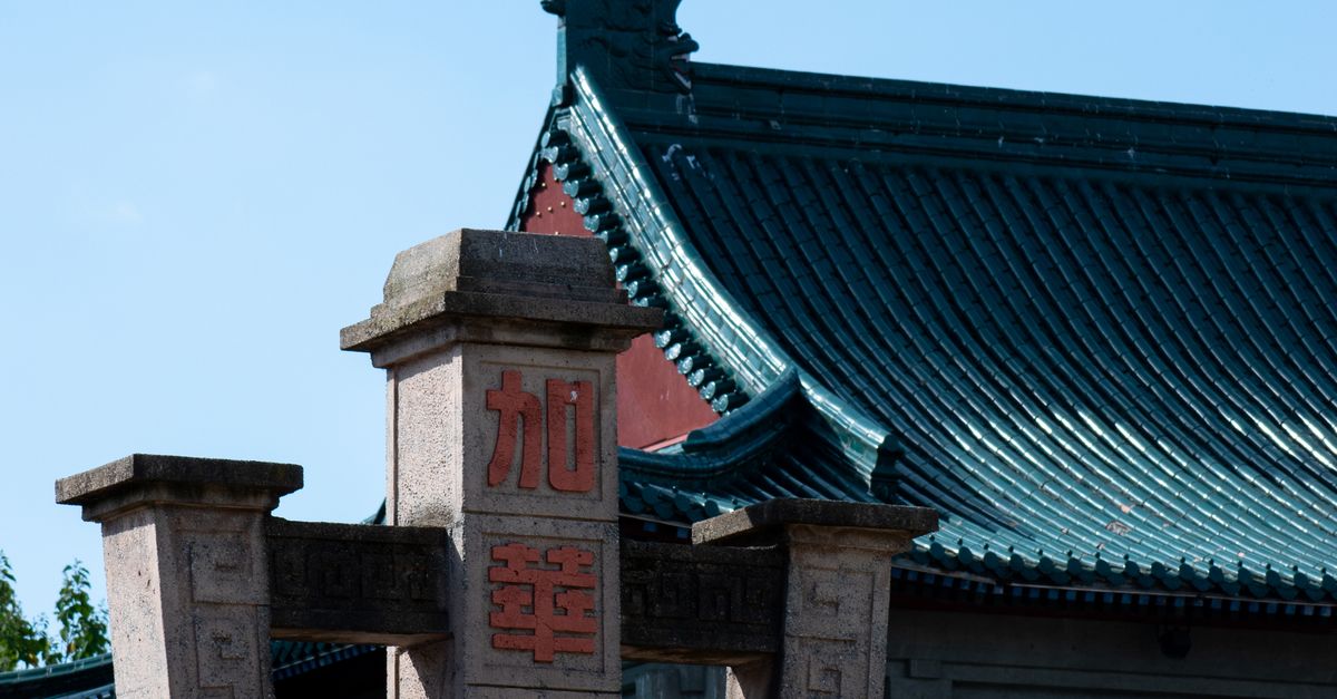 Chinese Signpost in Front of House · Free Stock Photo