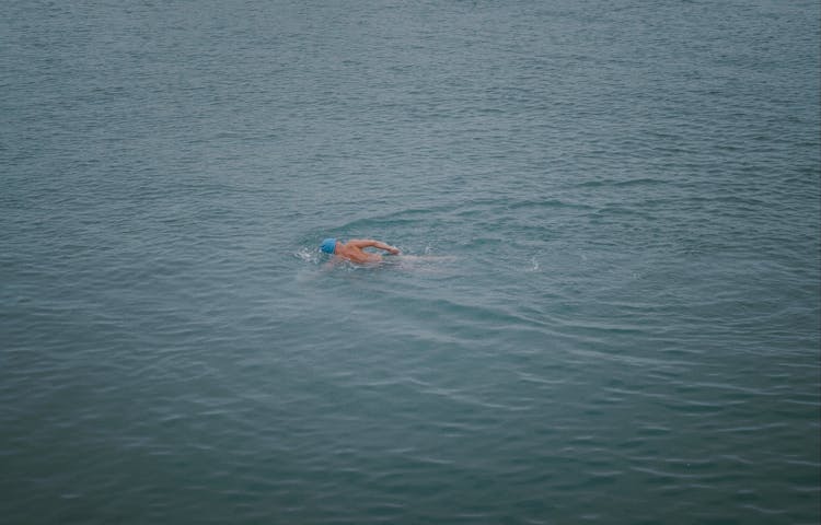 Person Swimming In The Sea