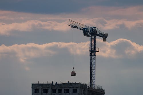 Crane Working on Building Construction