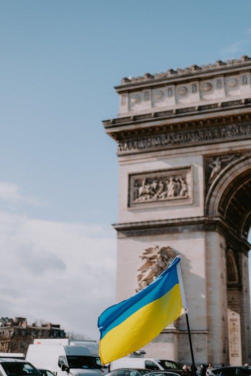 Free The National Flag of Ukraine by the Arc de Triomphe in Paris Stock Photo