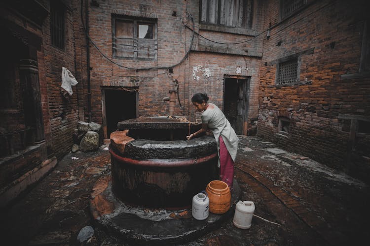 A Woman Fetching Water From Well