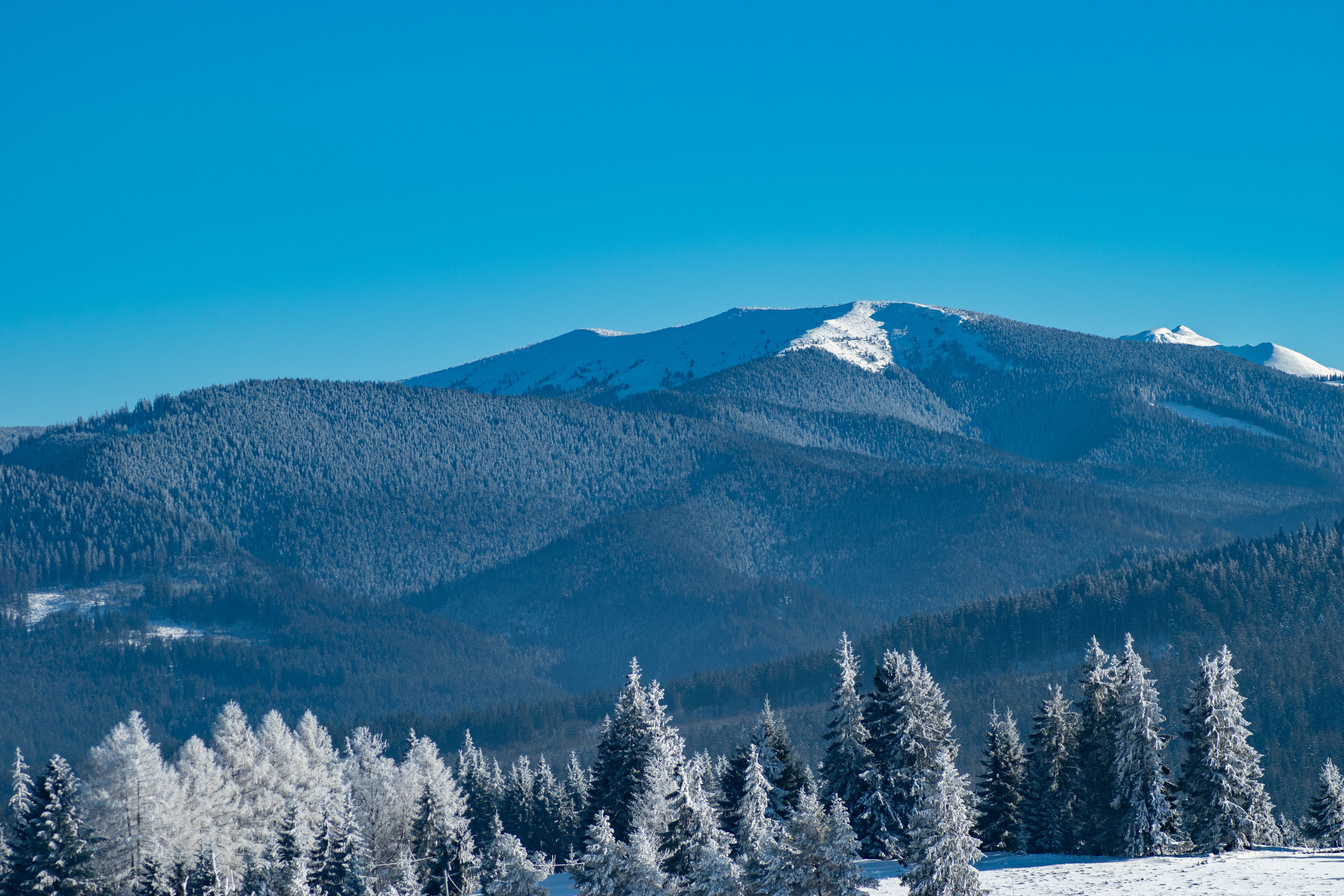 Snow Covered Mountain Under the Blue Sky · Free Stock Photo