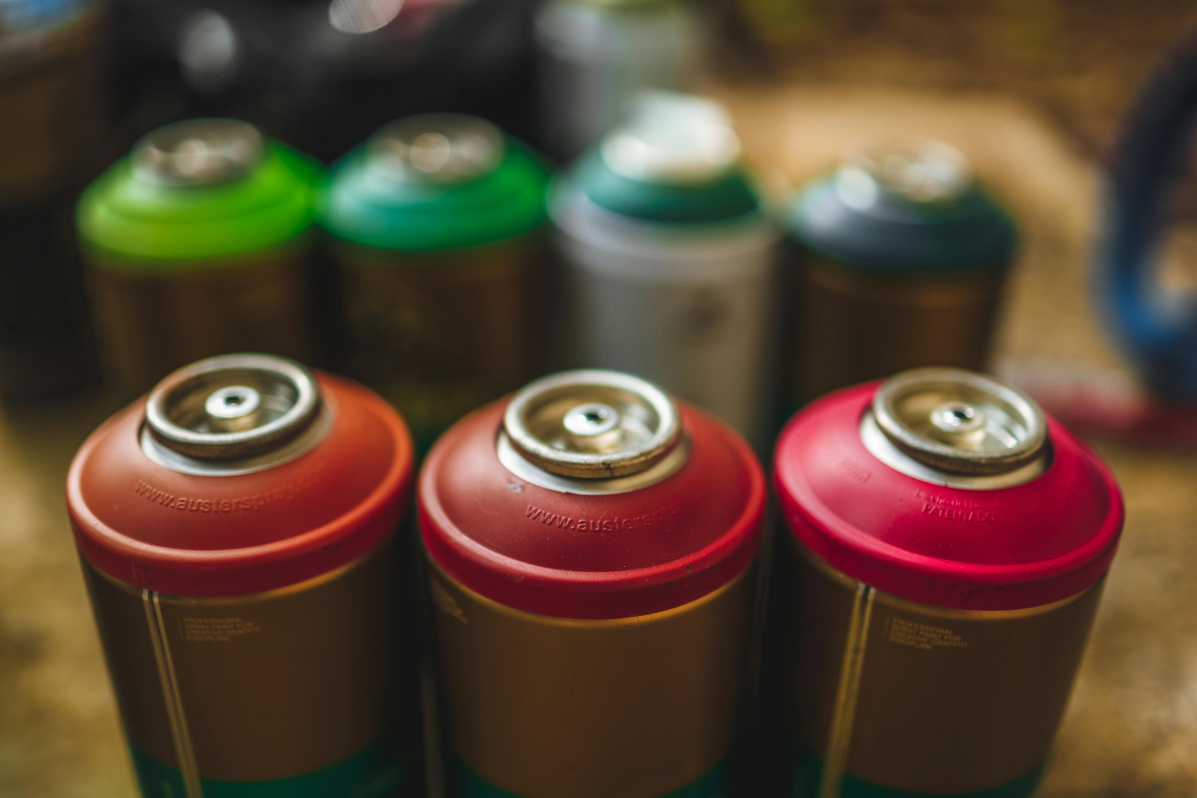 Close-up on Cans of Spray Paint