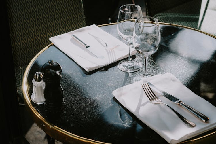 Simple Table Setting On Round Granite Table