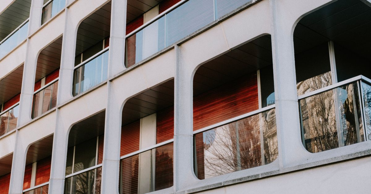 First-time buyer on a downtown Toronto condo balcony, a smart entry point to invest in today's housing market
