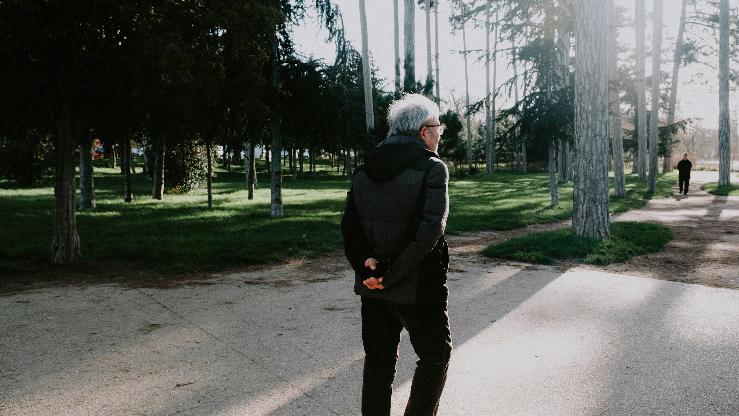 Man Walking in a Park · Free Stock Photo