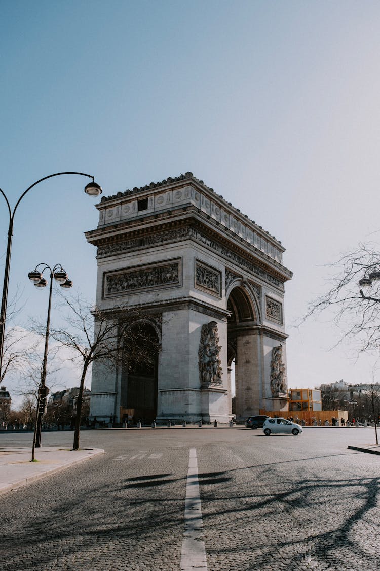 Cars Passing Near The Arch Of Triumph In Paris