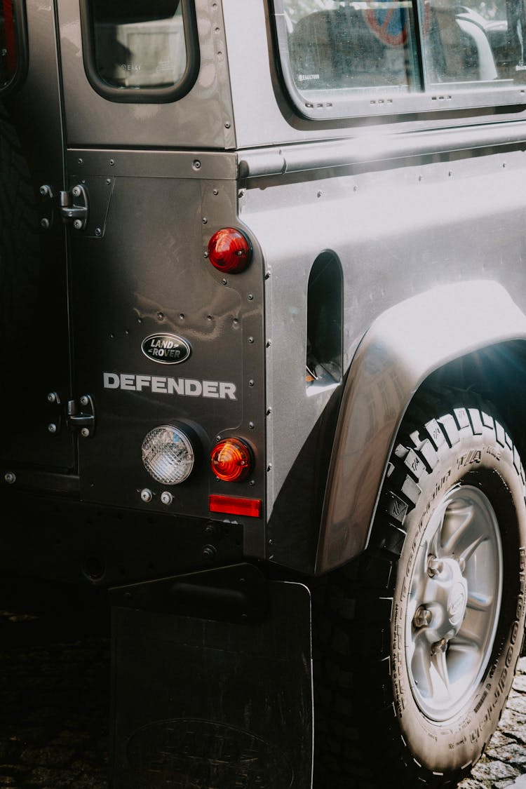 Shiny Rear Of Land Rover Defender4x4 Car