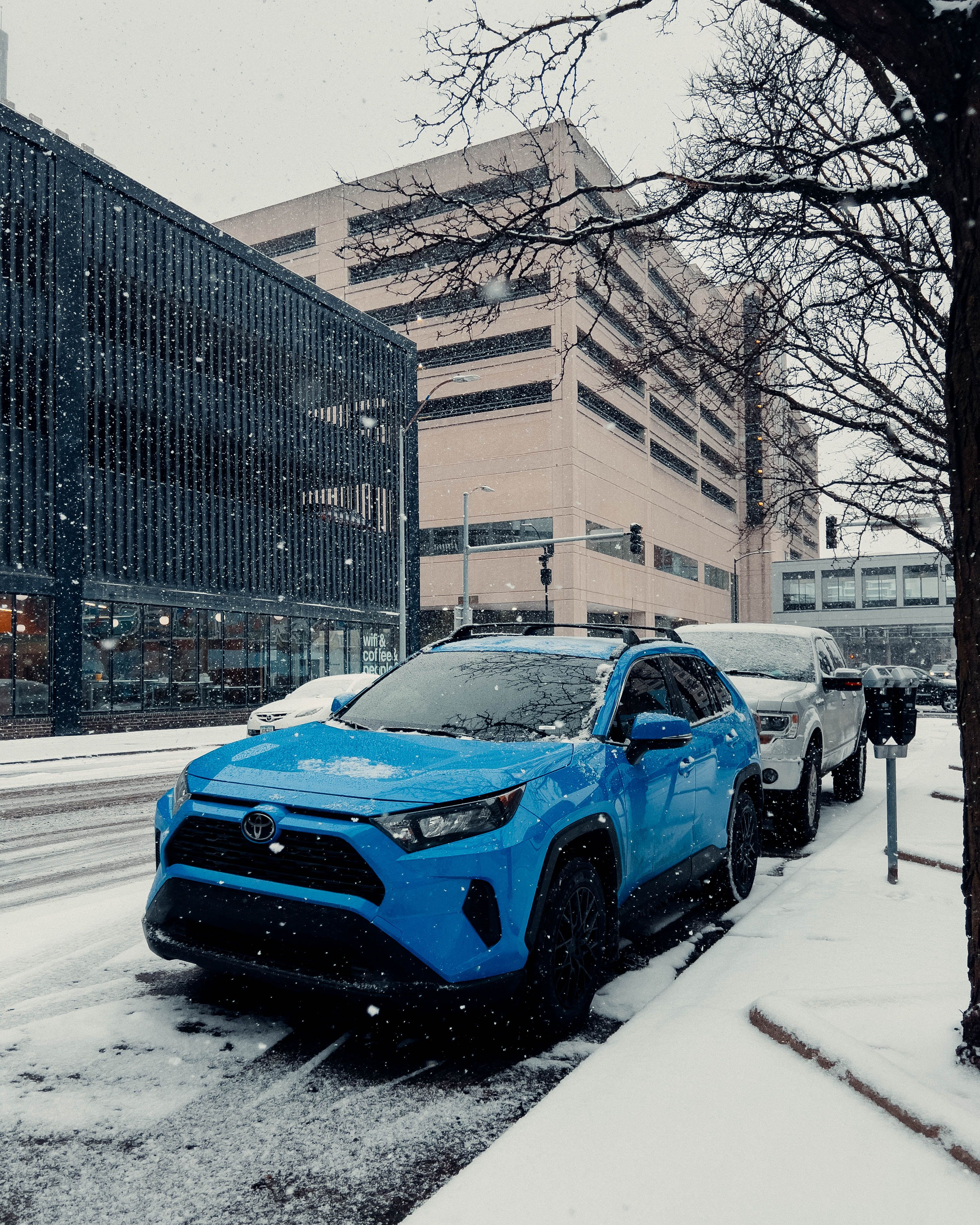 Cars Parked on the Side of a Street and Snowfall in City · Free Stock Photo