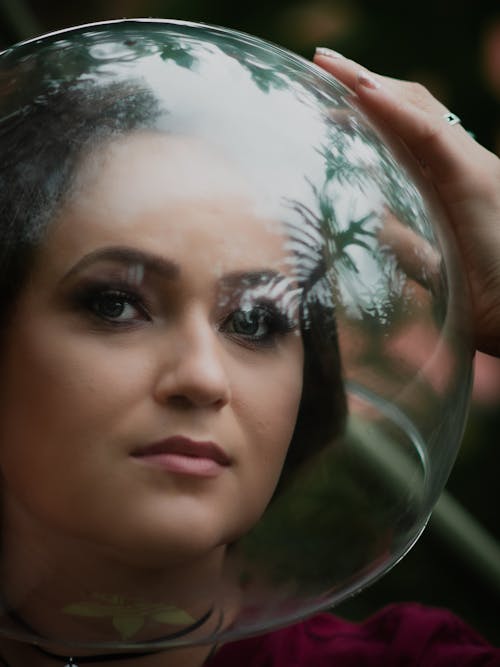 Free A Woman's Head Inside a Crystal bowl Stock Photo