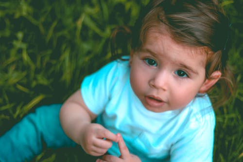 Free Close-Up Photography of a Baby Girl Stock Photo