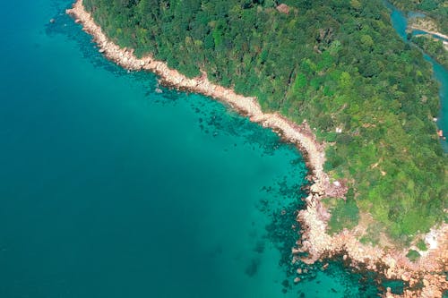 Free Aerial Photo of Island With Green Trees at Daytime Stock Photo