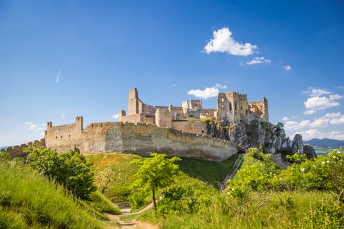 Free Discover the historic Beckov Castle ruins against a vivid blue sky in Slovakia. Stock Photo