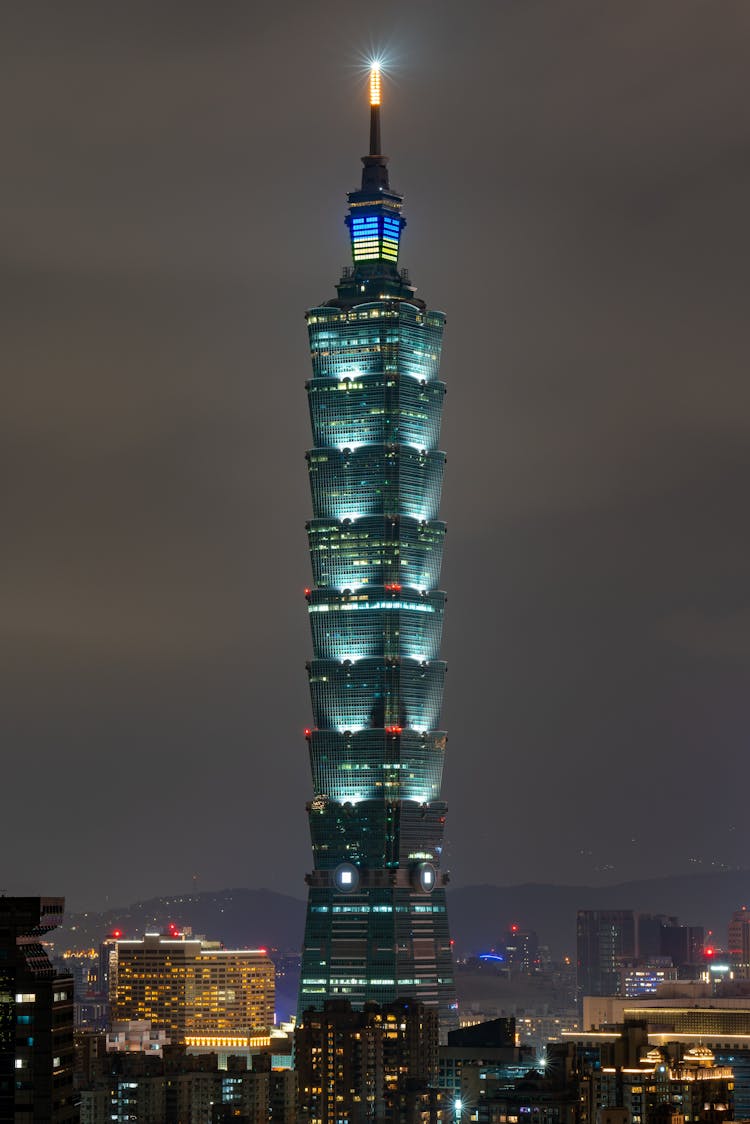 City Tower In Lights In Night Sky