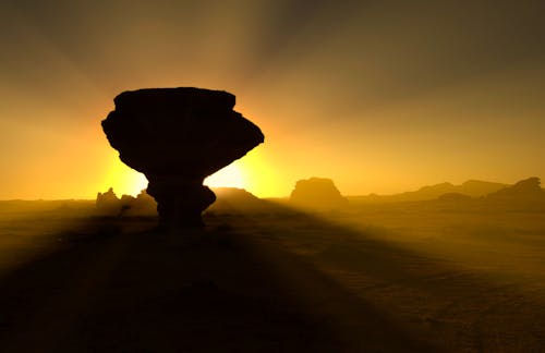 Free Golden Hour Silhouette of Rock Formation  Stock Photo