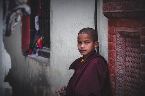 A Boy in a Monk Traditional Wear