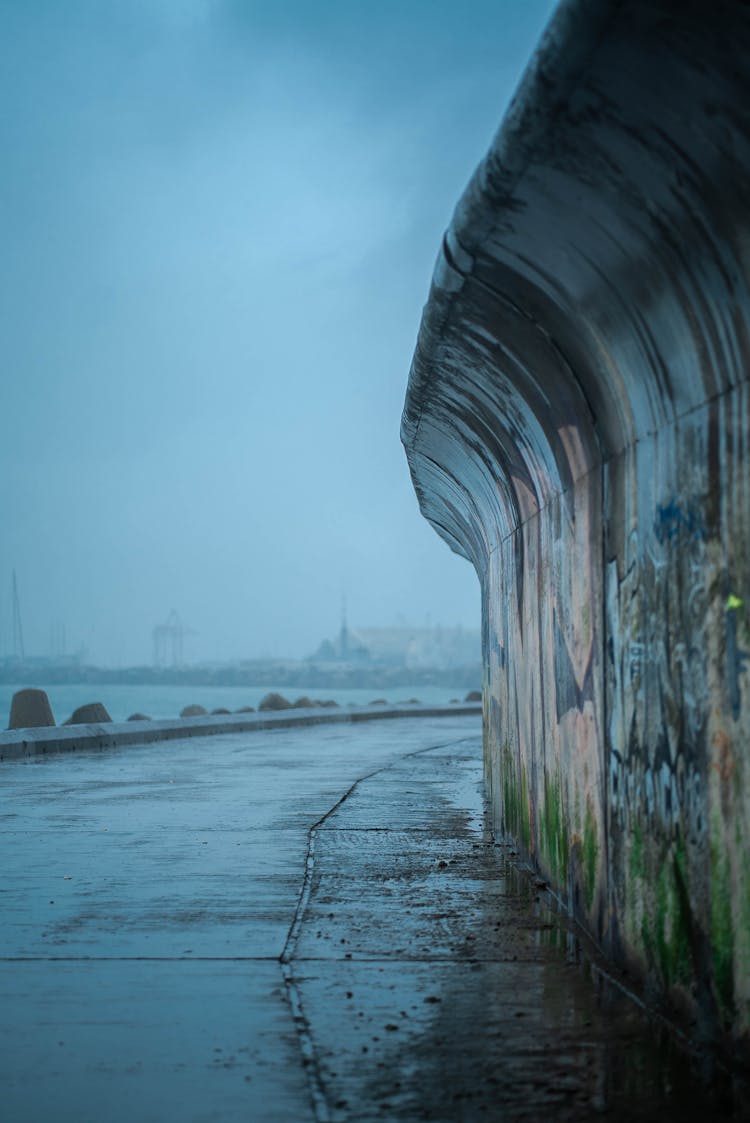 Wall In Graffiti Along Sea