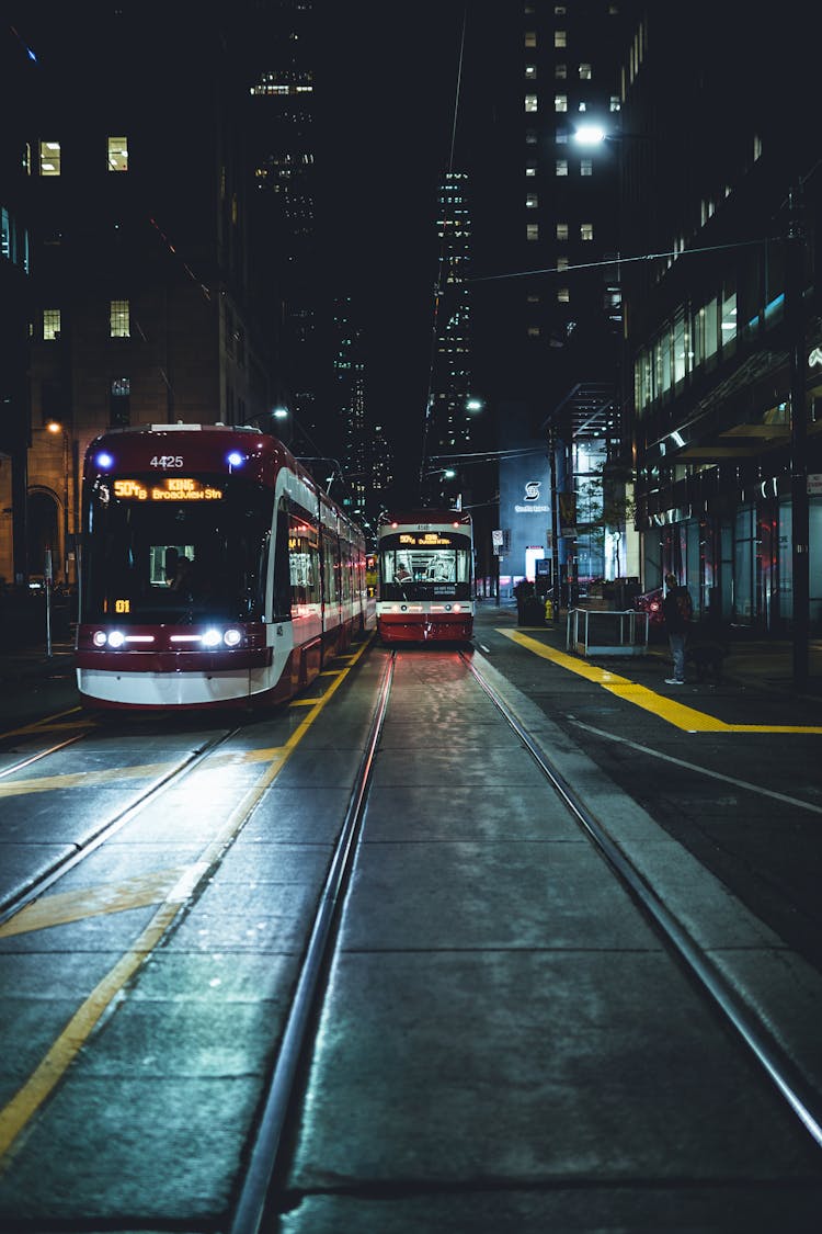 Trams On The Road At Night