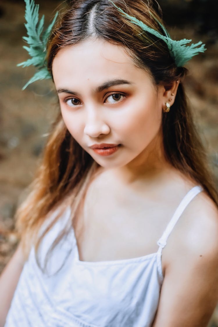 Woman In White Tank Top With Leaves Headdress 