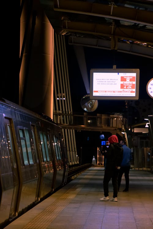 People Standing on Train Platform