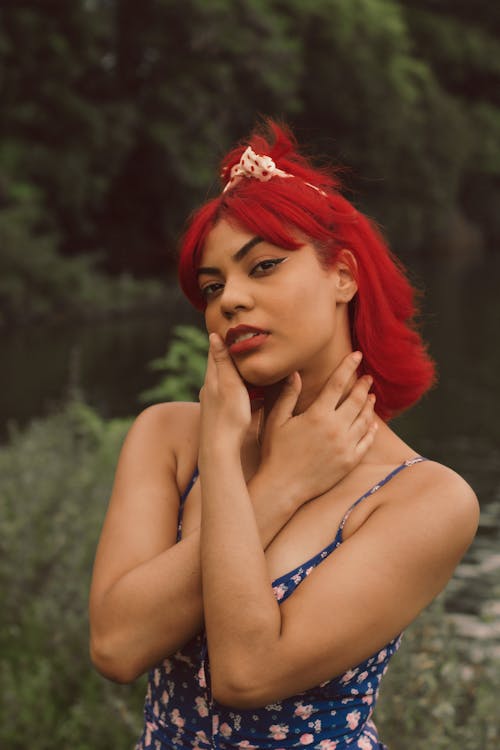 A Woman with Red Hair while Posing